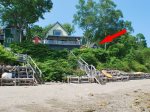 Although the cottage is not direct waterfront, the beach is a 2 minute walk via a neighborhood right-of-way.  Harmony indicated by the red arrow